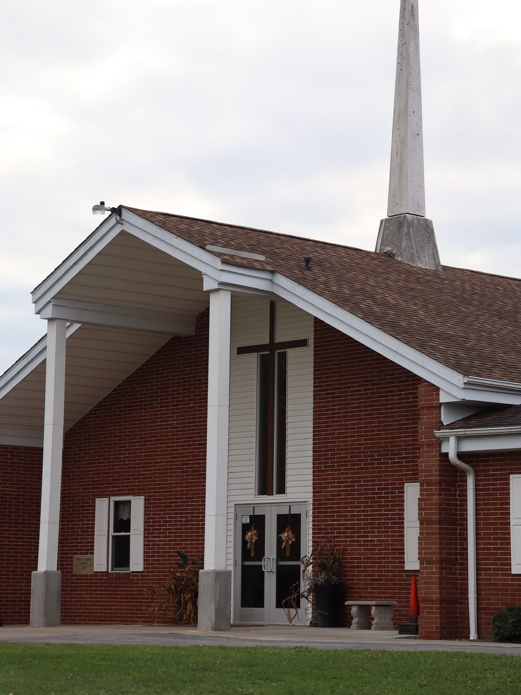 The Trinity Friends Church building in Lisbon, Ohio, with its steeple and cross